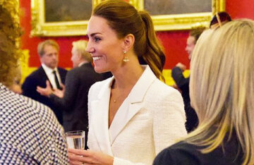 All in white: Kate Middleton at the presentation of her new photo project