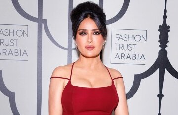 Salma Hayek steps out in a tight red dress and a bouffant hairstyle