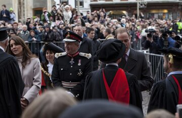 Catherine, Duchess of Cambridge, smiling while greeting people at Market Square in Cambridge