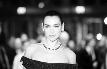 Dua Lipa posing for a portrait photo