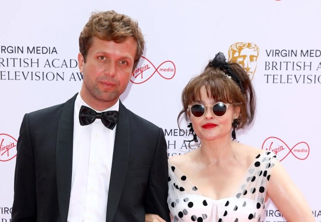 Helena Bonham Carter sparks engagement rumors with boyfriend Ray Doug Holmboe, who is 23 years her junior