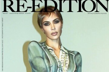 Kim Kardashian posed for a glossy magazine wearing body art instead of clothes.