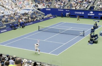 Carlos Alcaraz playing tennis during a match at the 2026 US Open